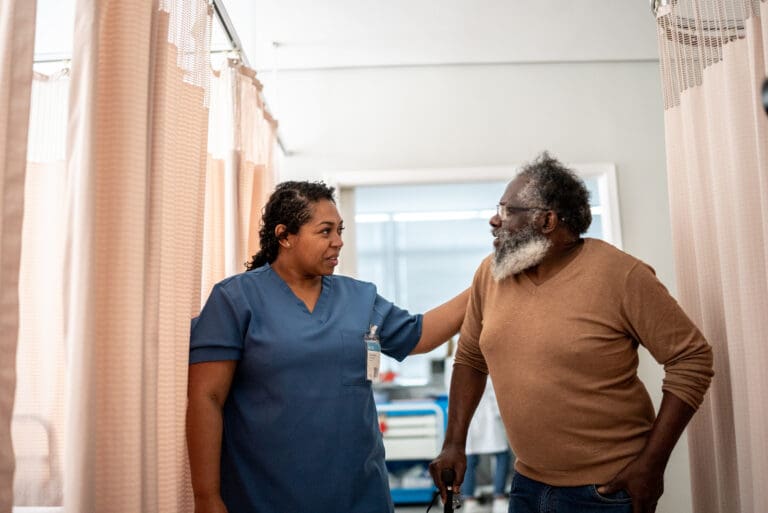 Doctor talking to patient during medical appointment in a hospital